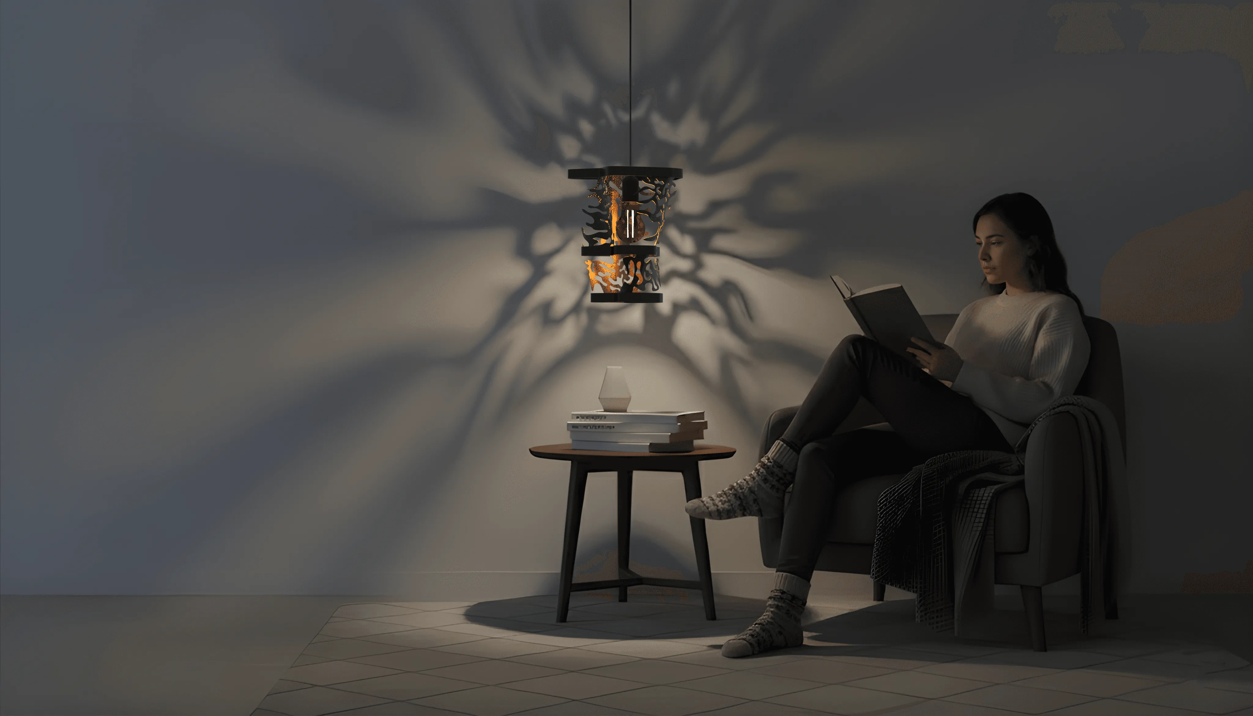 Distortion, a pendant lamp of layered plasma-cut steel discs finished in matte black.